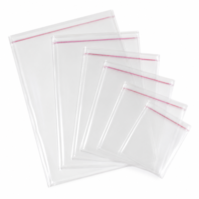 clear-self-sealing-cellophane-bags-small-sizes.jpeg Clear self-sealing cellophane bags in multiple small sizes with adhesive closure strips