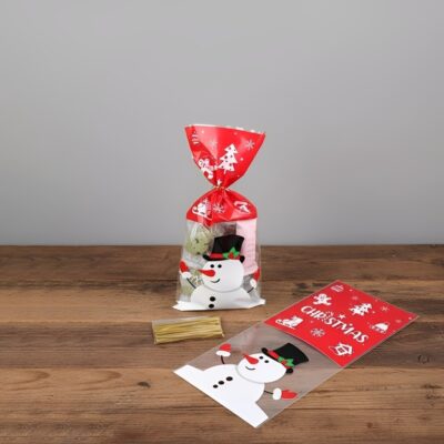 CHRISTMAS CELLOPHANE  BAG 12*27.5 WITH TIE SNOWMAN