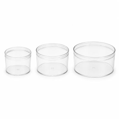 Clear round transparent plastic packaging boxes in three different sizes on a white background.